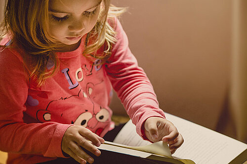Child reading Girl reading a book
